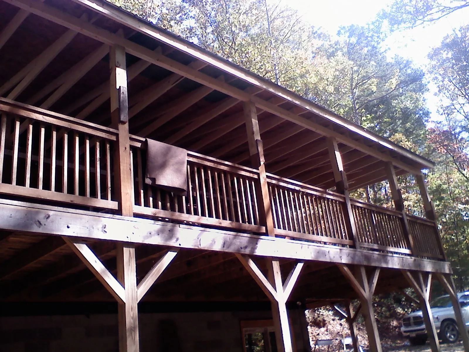 Timber framing under a new elevated porch and deck — Roof Leak Repair in Victorville by Roofing Brothers
